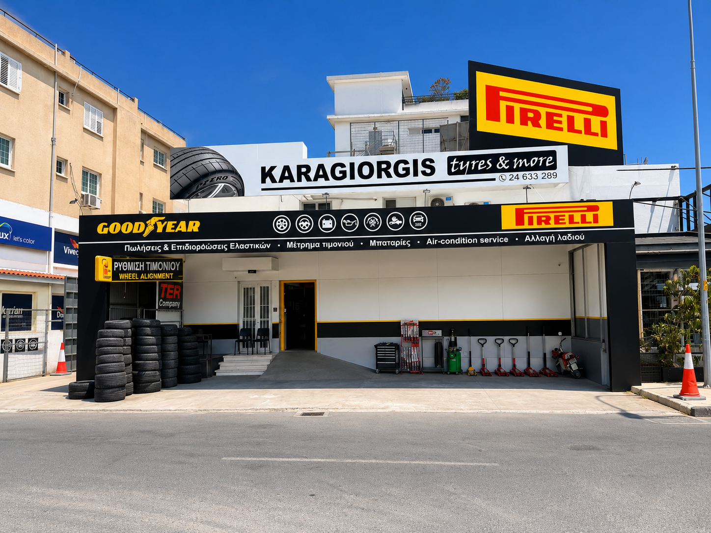 Karagiorgis Tyres & More storefront in Larnaca Cyprus offering tyres, wheel alignment, batteries, air-conditioning service, oil changes and key cutting services